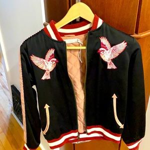 Beautiful Stella McCartney Girls Bomber Jacket. It can be used by an adult.